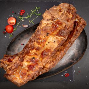 Spareribs gekruid en gegaard per 2 verpakt ca. 600 gram ( totaal ca. 1,2 Kg )